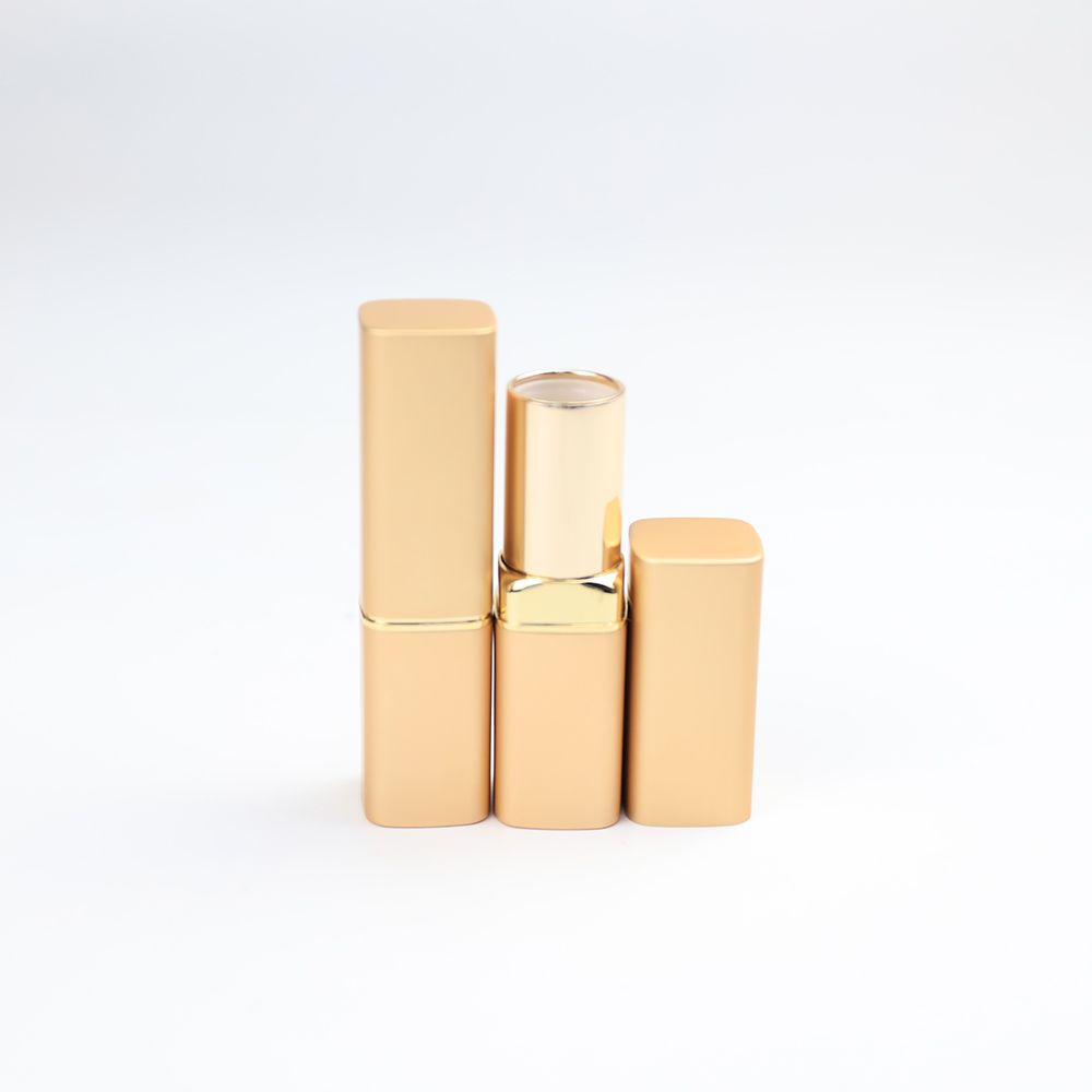 Proveedor de envases de tubos de lápices labiales al por mayor de aluminio dorado negro cuadrado de 3,8 g