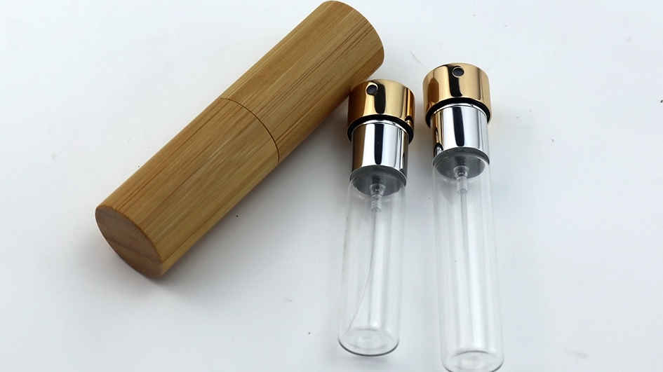 Presentación de nuestro nuevo atomizador de perfume giratorio de bambú con cáscara: una mezcla de naturaleza e innovación
