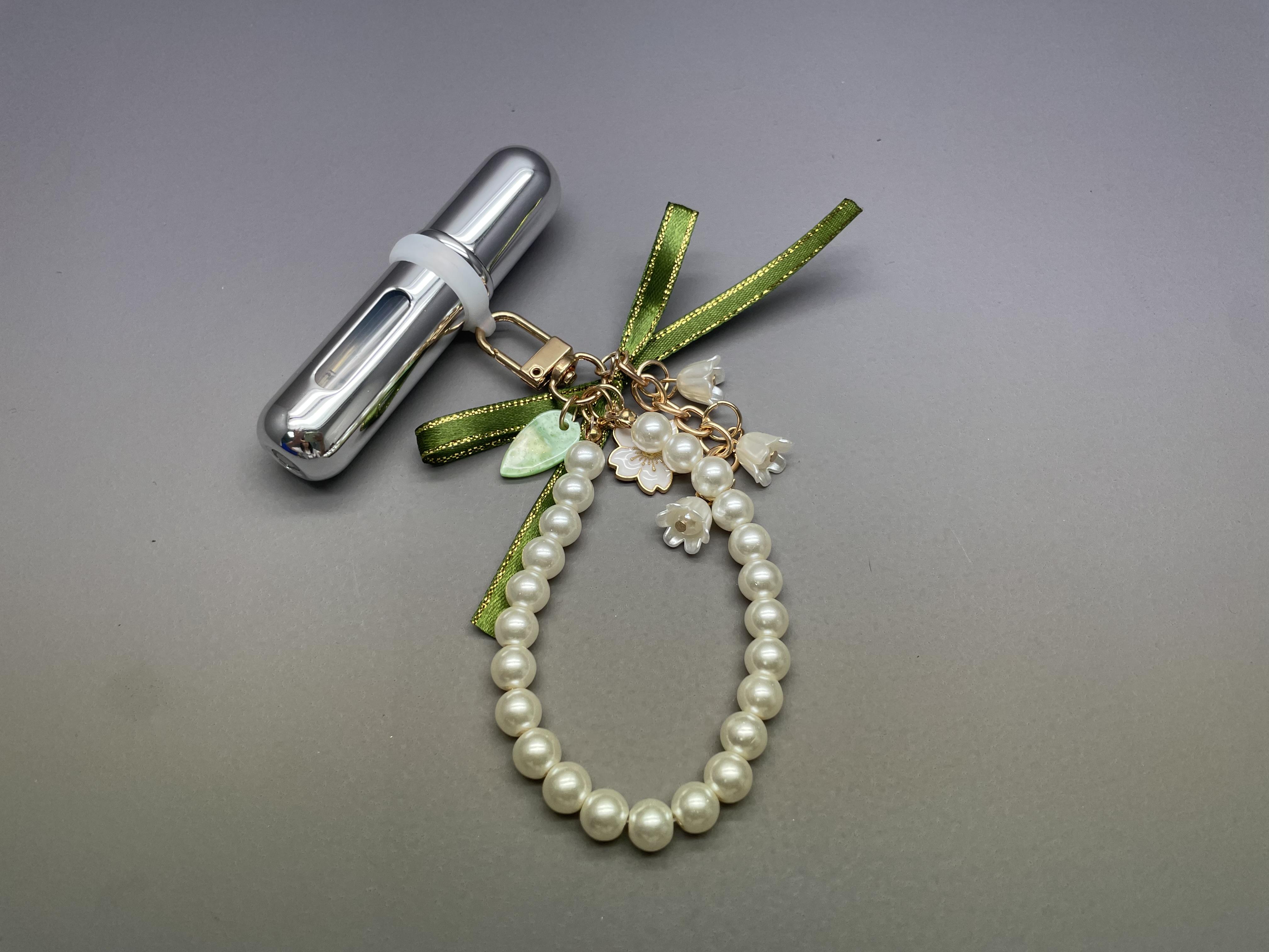 Botella de atomizador de perfume recargable de aluminio con llaves con llaves