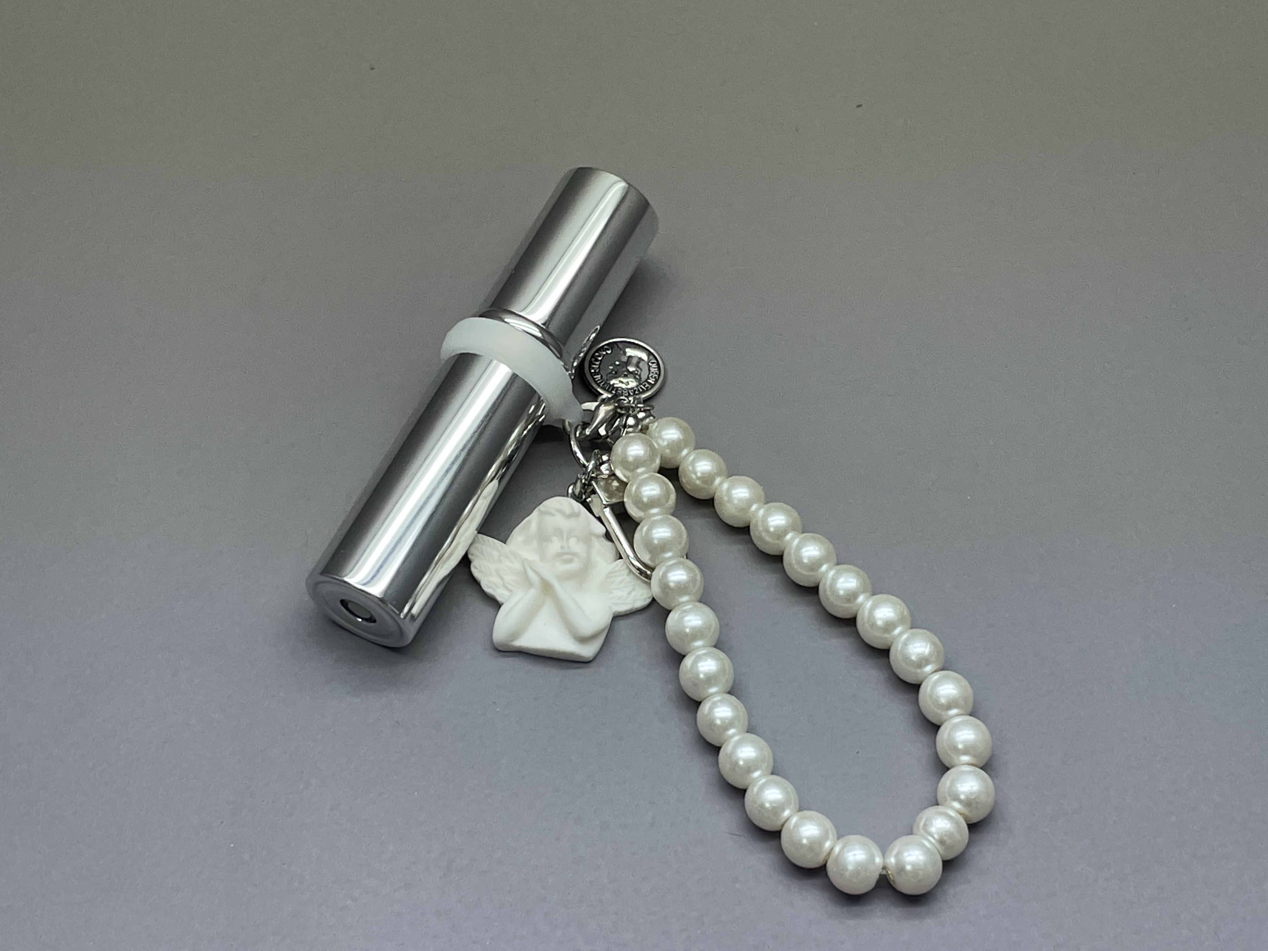 Botella de atomizador de perfume recargable de aluminio con llaves con llaves